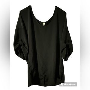 Black super cute XL shirt. I would not sell if I could fit it, but lost weight.